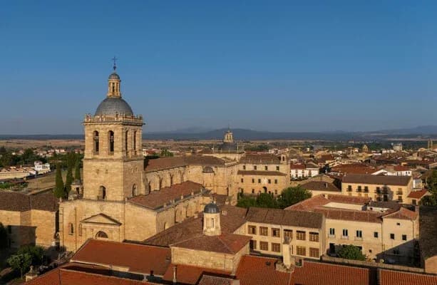 Historical buildings and rooftops under clear sky