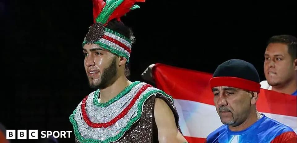 Boxer entering the ring with traditional attire