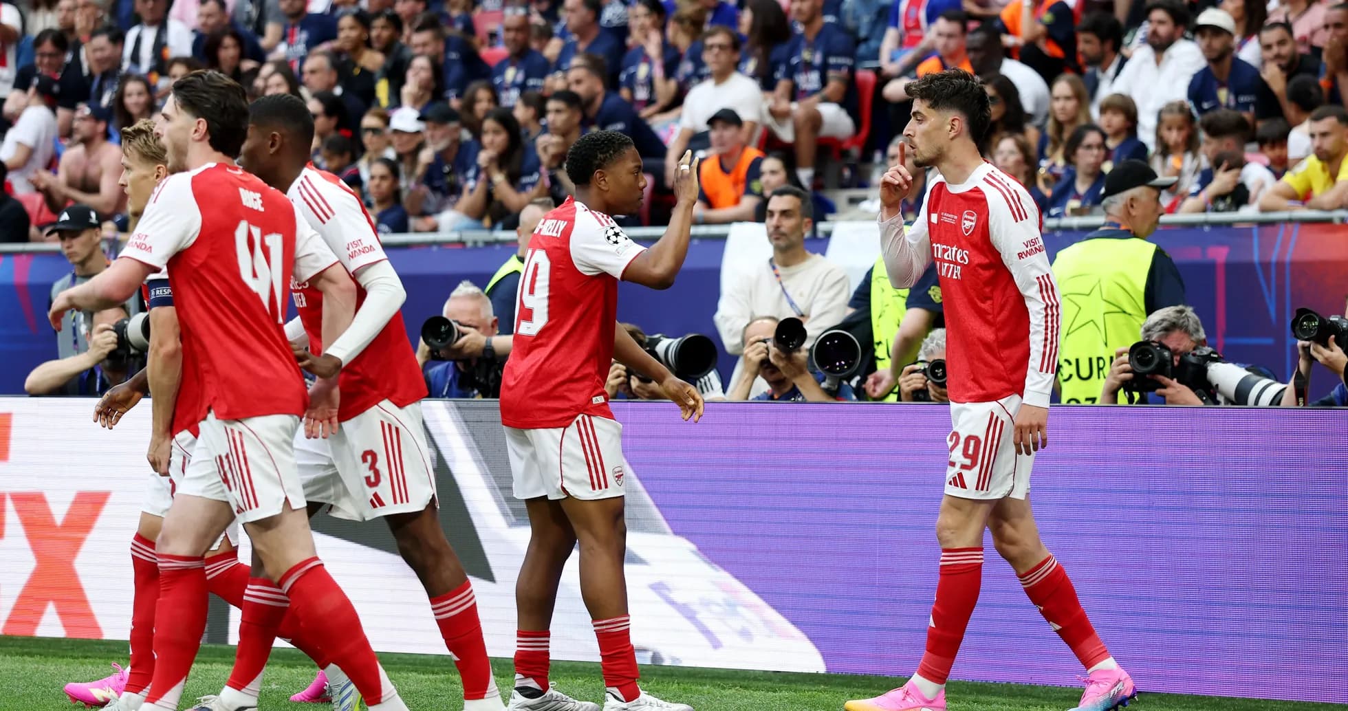 Arsenal players celebrating during a match