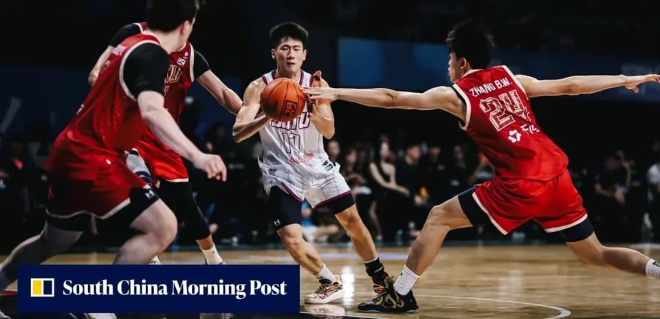 Two players contesting for the basketball during game