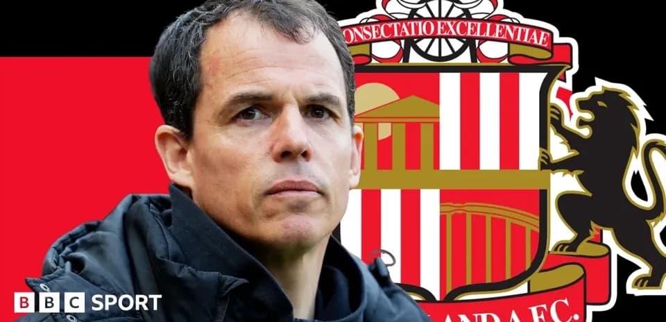Sunderland AFC manager with club logo background