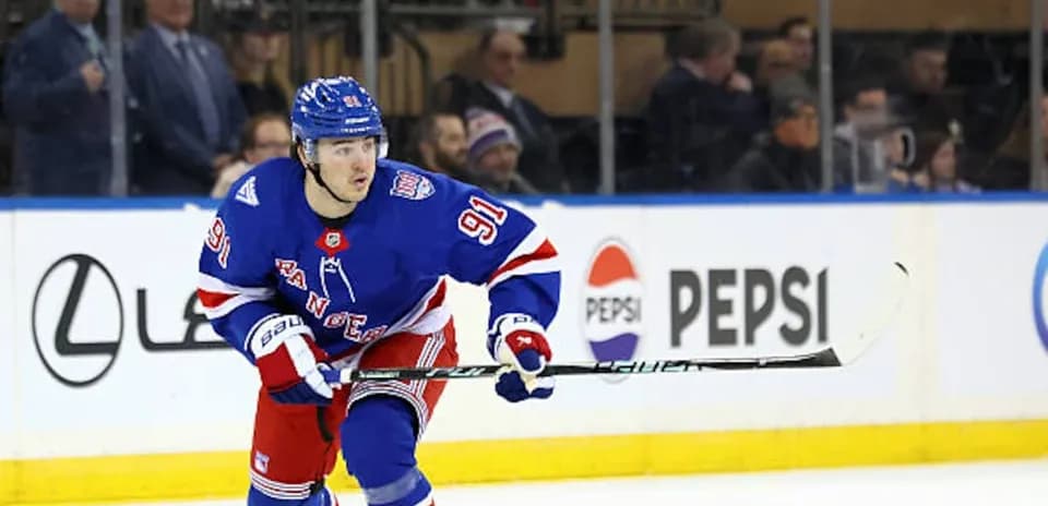 Hockey player skating on ice during game