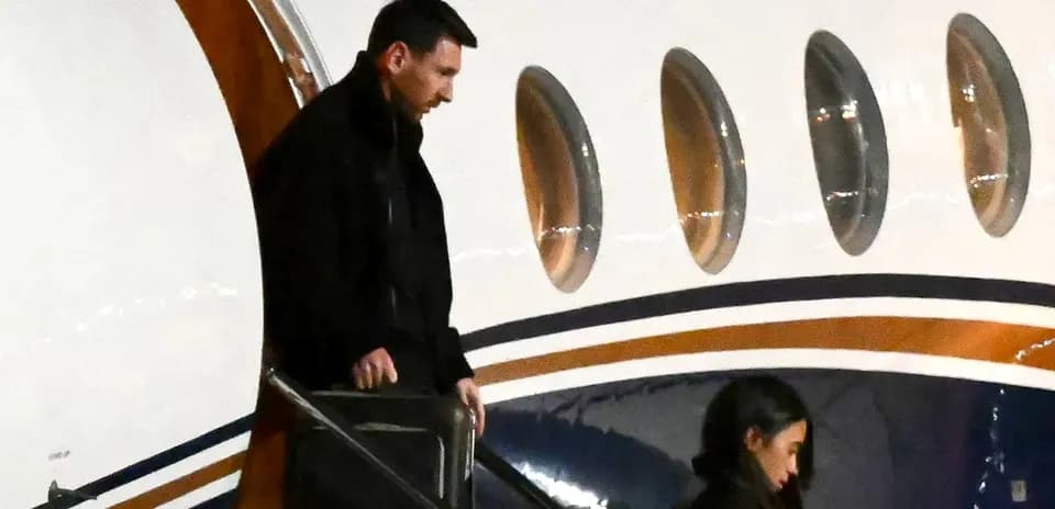 Football player disembarking from private jet