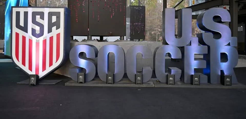 USA Soccer logo displayed at an event