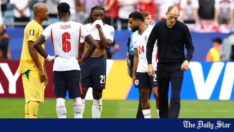 England players discussing strategy during match