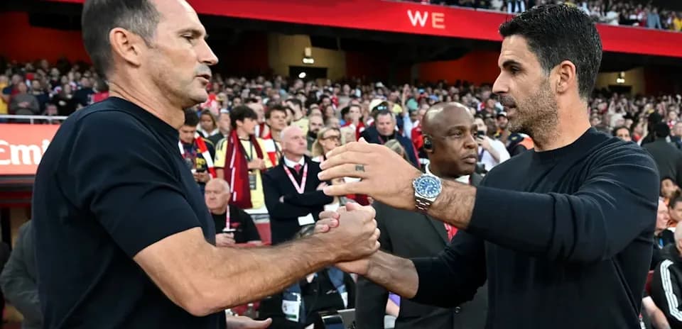 Trainers shaking hands before the match