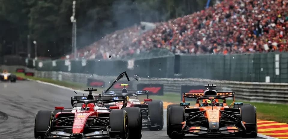 Formula 1 cars colliding on track during race
