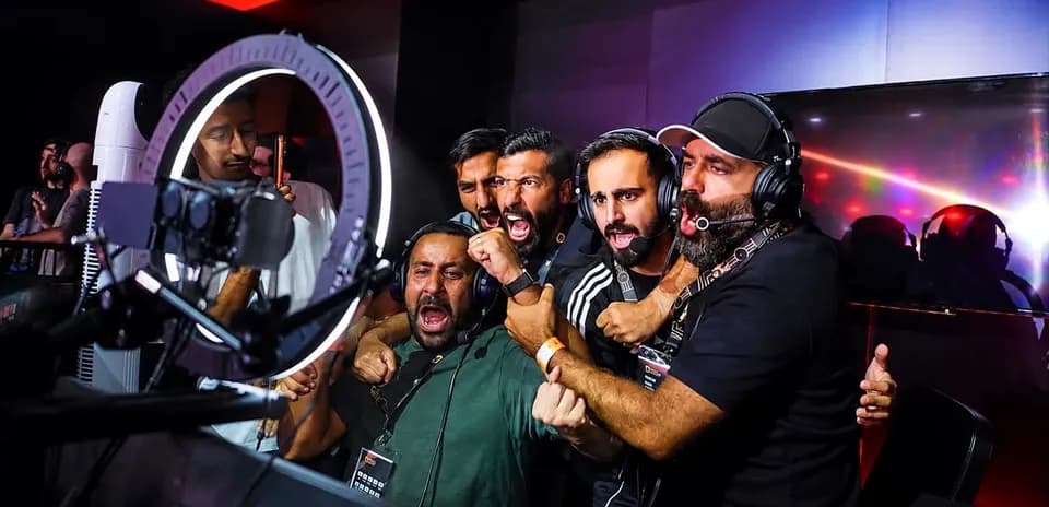Commentators celebrating intensely during esports event