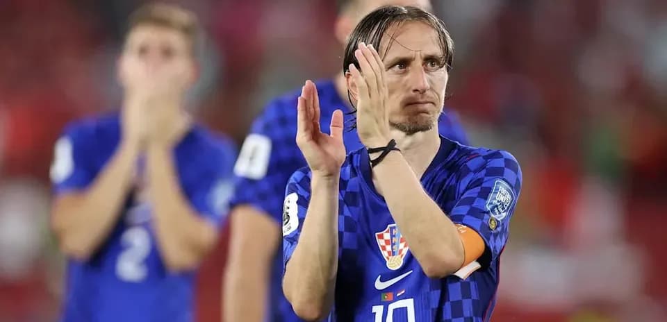 Luka Modric applauding fans after the match