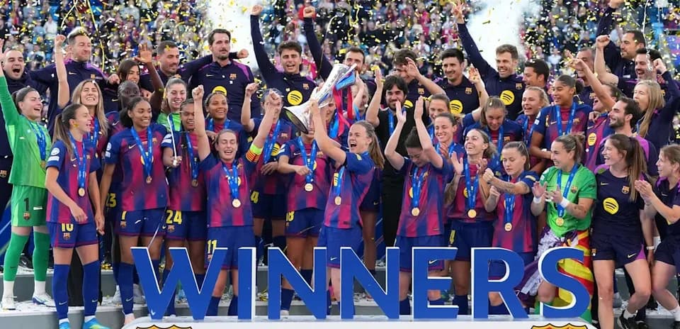 FC Barcelona women's team celebrating UEFA trophy win