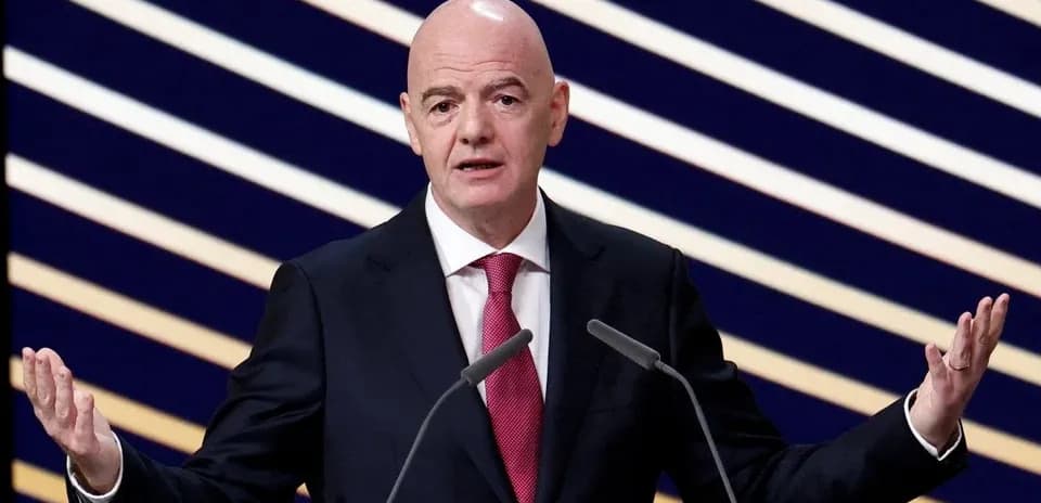 FIFA president speaking at a podium