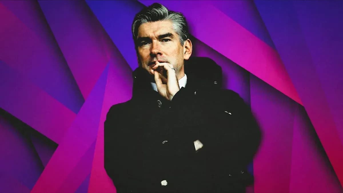 Coach with hand on chin against colorful background