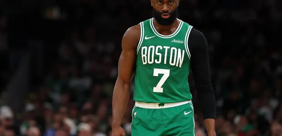 Basketball player in Boston Celtics uniform on court