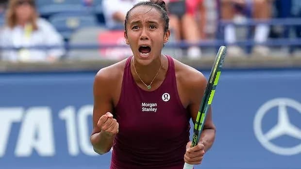 Tennis player celebrating during a match