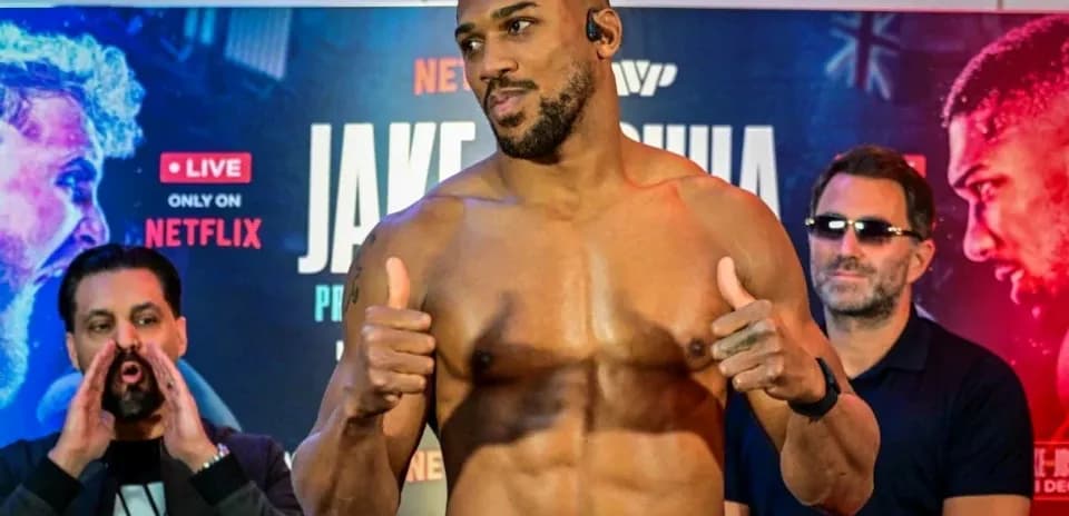Boxer posing at press conference for fight announcement