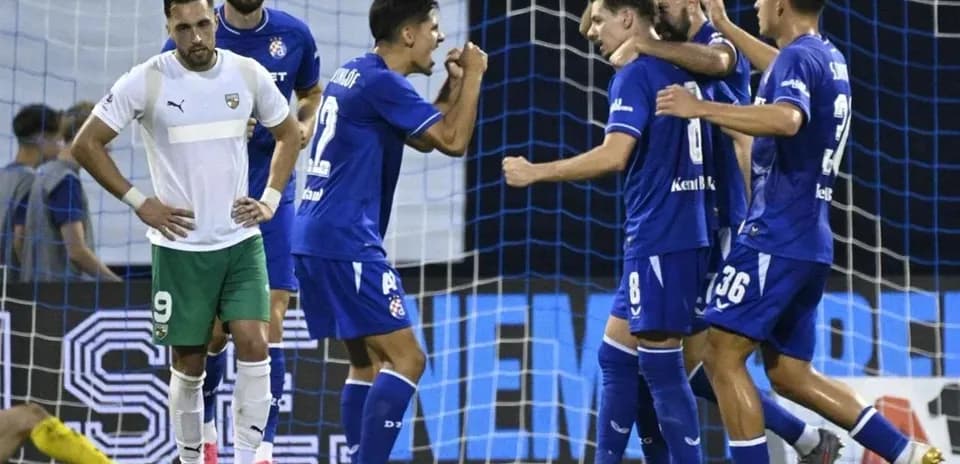 Players celebrating a goal in football match