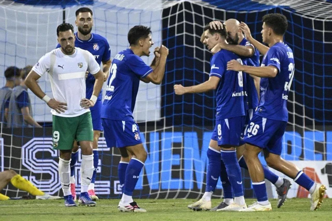 Players celebrating a goal in football match