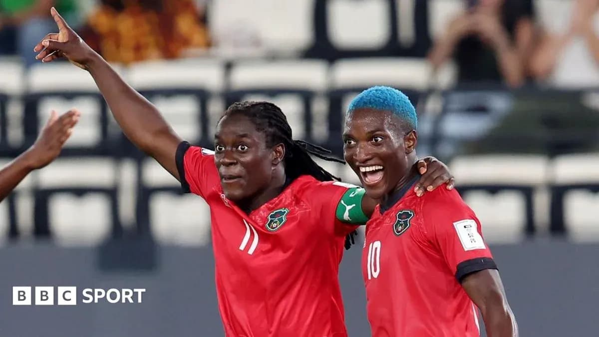 Two players celebrating after scoring a goal