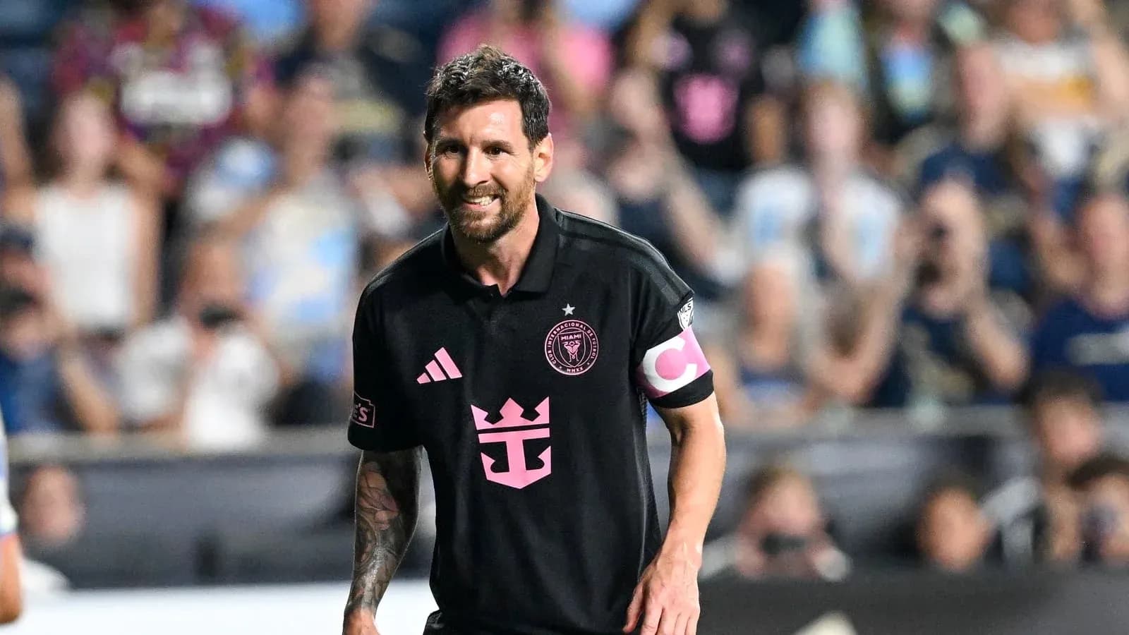 Lionel Messi wearing Inter Miami jersey on field