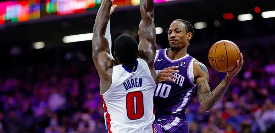 Player attempting a shot while being defended