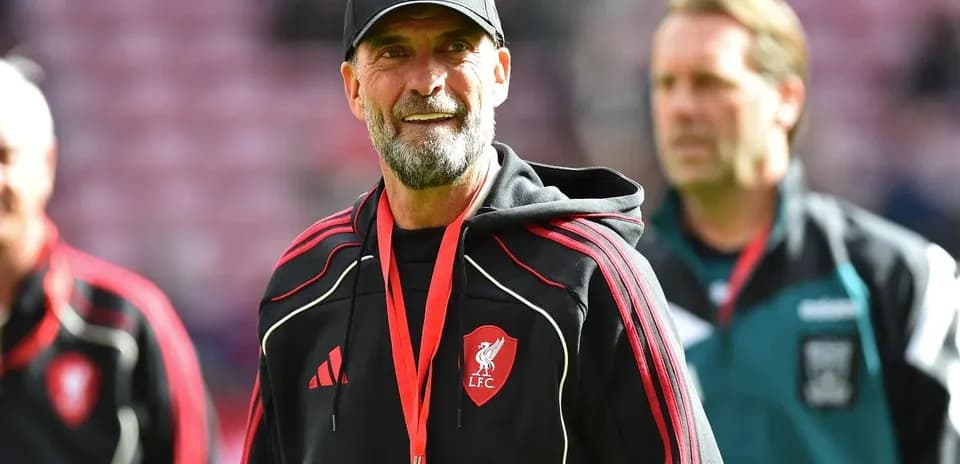Liverpool FC manager on the pitch during match