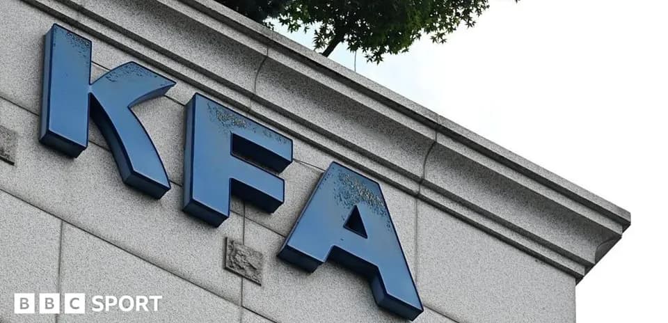 KFA logo on building exterior with trees