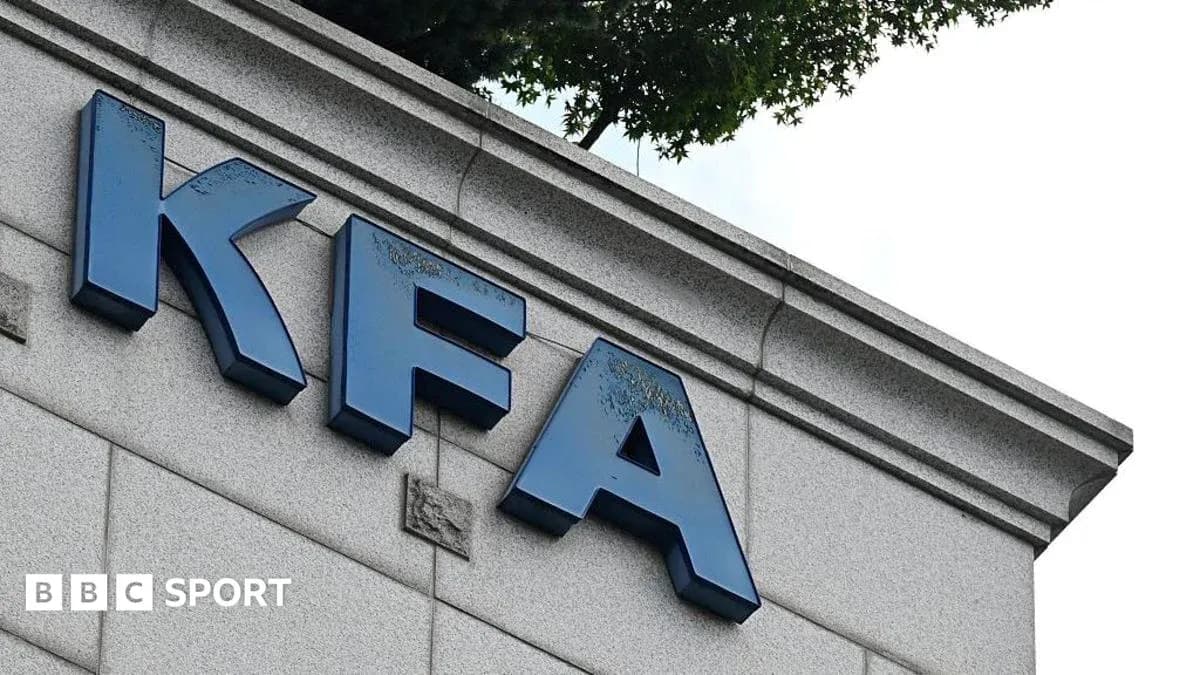 KFA logo on building exterior with trees