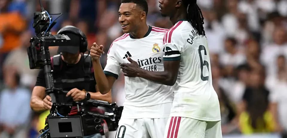 Mbappe celebrating with Camavinga during match