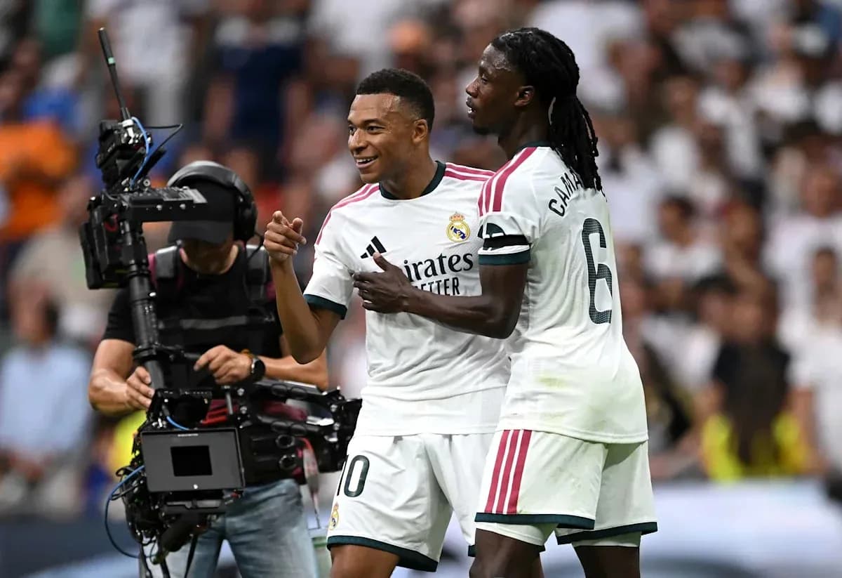Mbappe celebrating with Camavinga during match