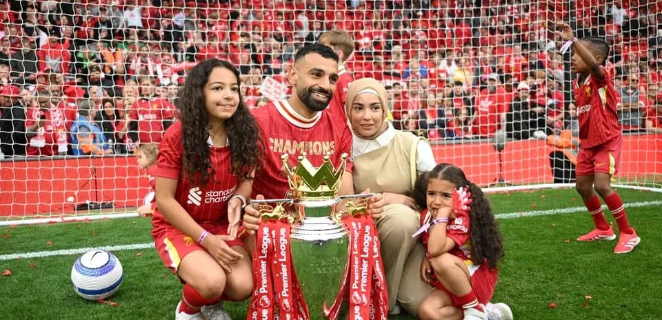 Mohamed Salah with family and Premier League trophy
