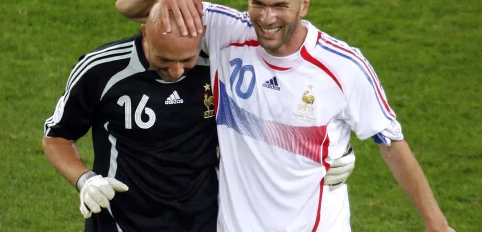 Zinedine Zidane and goalkeeper celebrating together