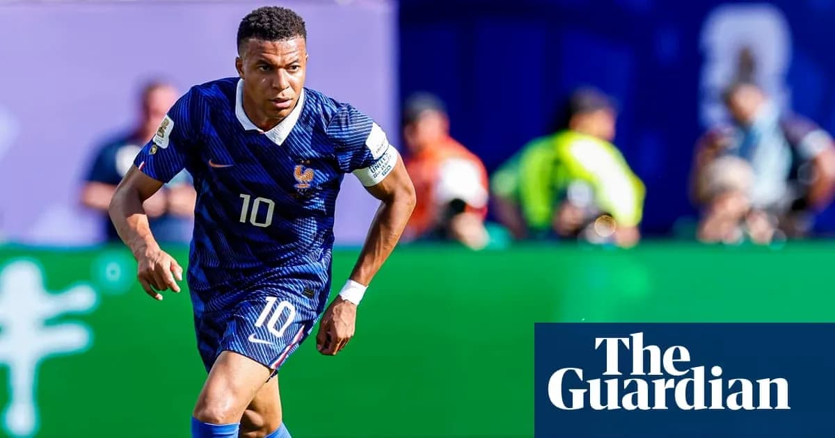 Kylian Mbappé dribbling during football match