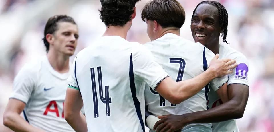 Tottenham players celebrating a goal together