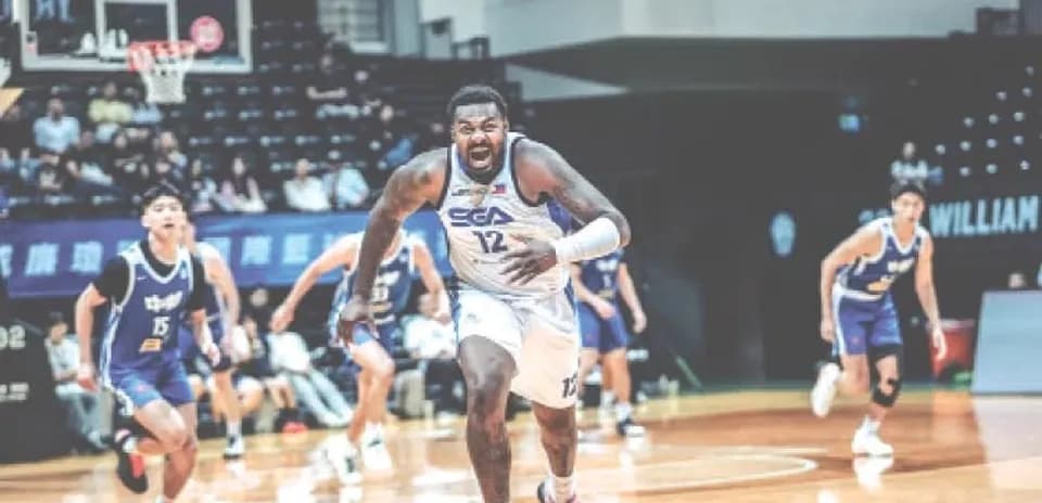 Player sprinting after the basketball during game