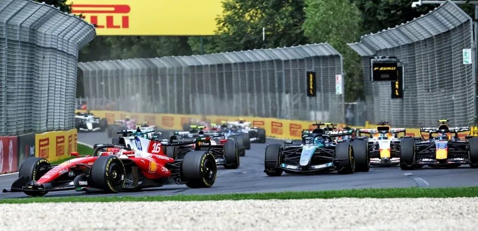 Formula 1 cars racing on track during Grand Prix