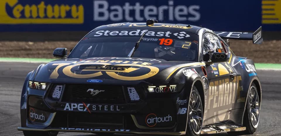 Race car driving on track during competition