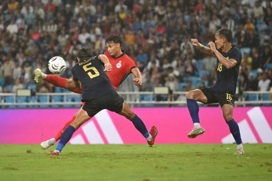 Player attempting to pass the ball during match