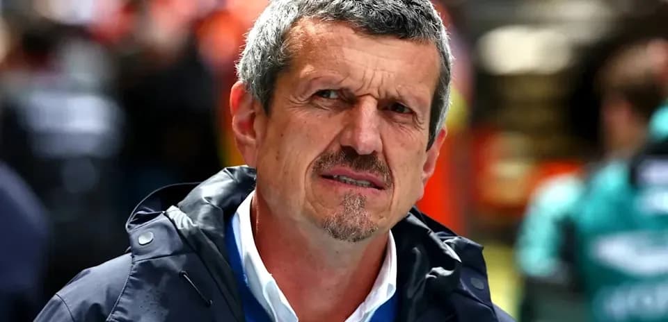 Team principal in pit lane during race event