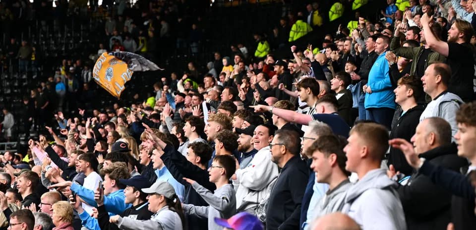 Jubilation of fans cheering in the stadium
