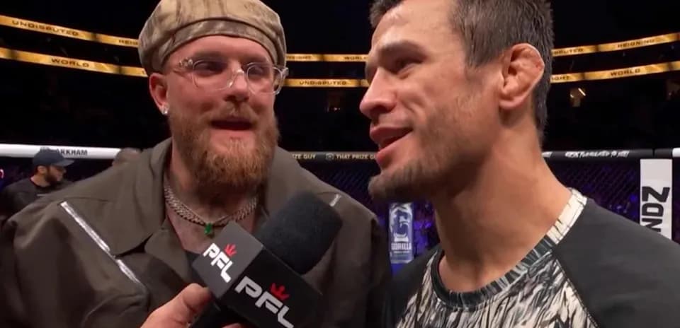 Interviewer speaking with fighter after match