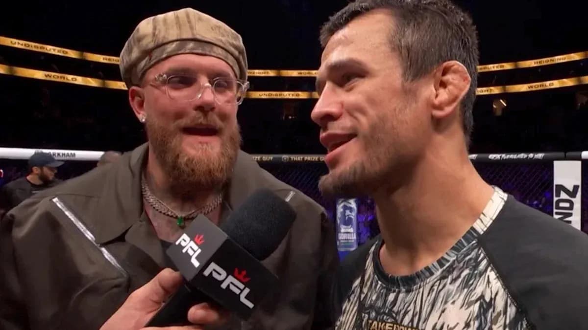 Interviewer speaking with fighter after match