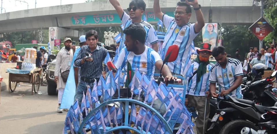 Fans celebrating with flags before match