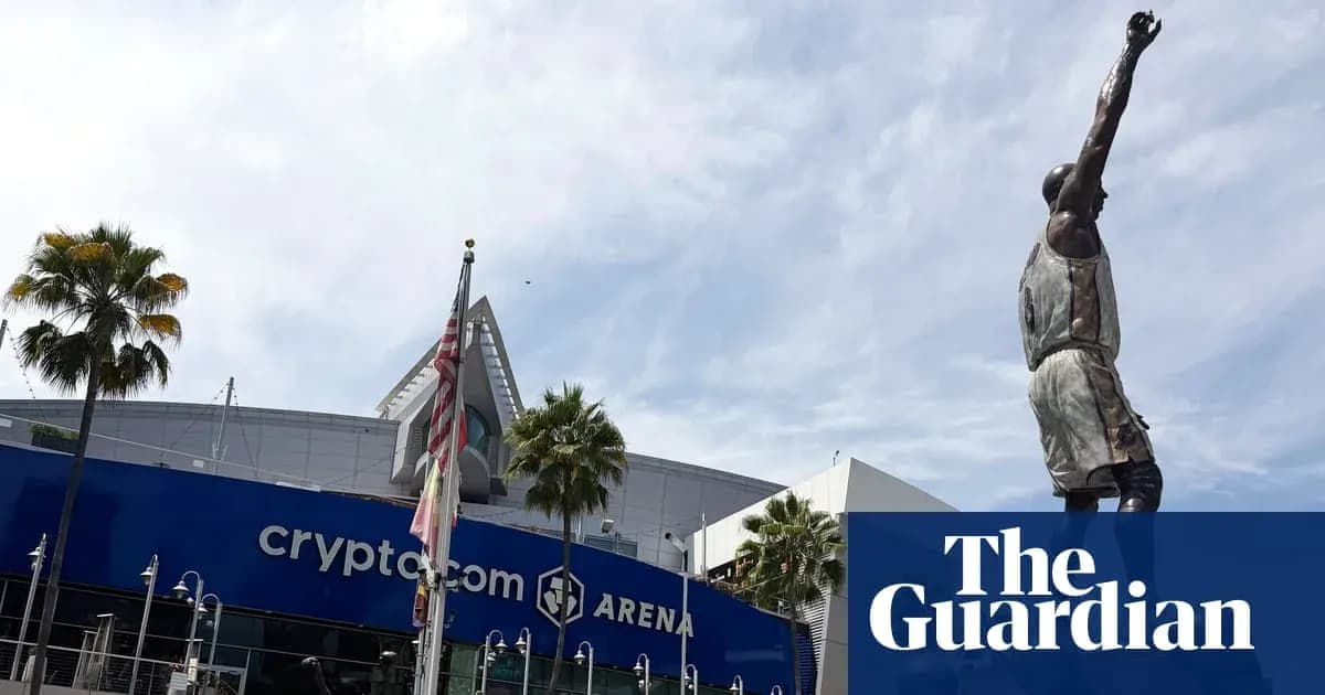 Statue outside crypto.com Arena with palm trees