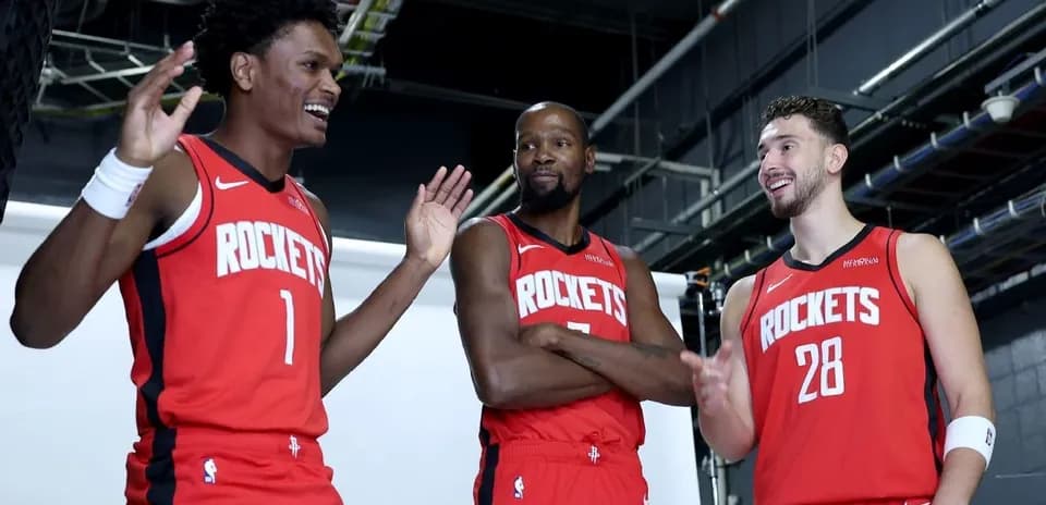 Three Houston Rockets players posing for photoshoot