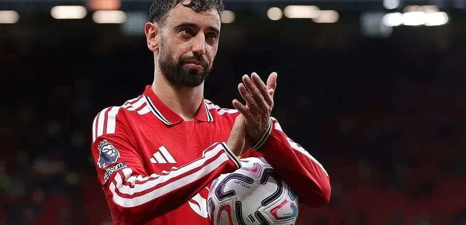 Bruno Fernandes applauding fans at Old Trafford