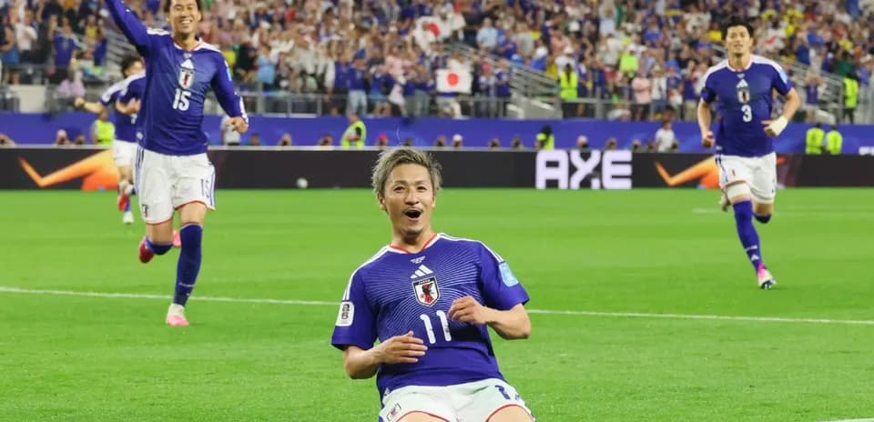 Japan players celebrating a goal during match