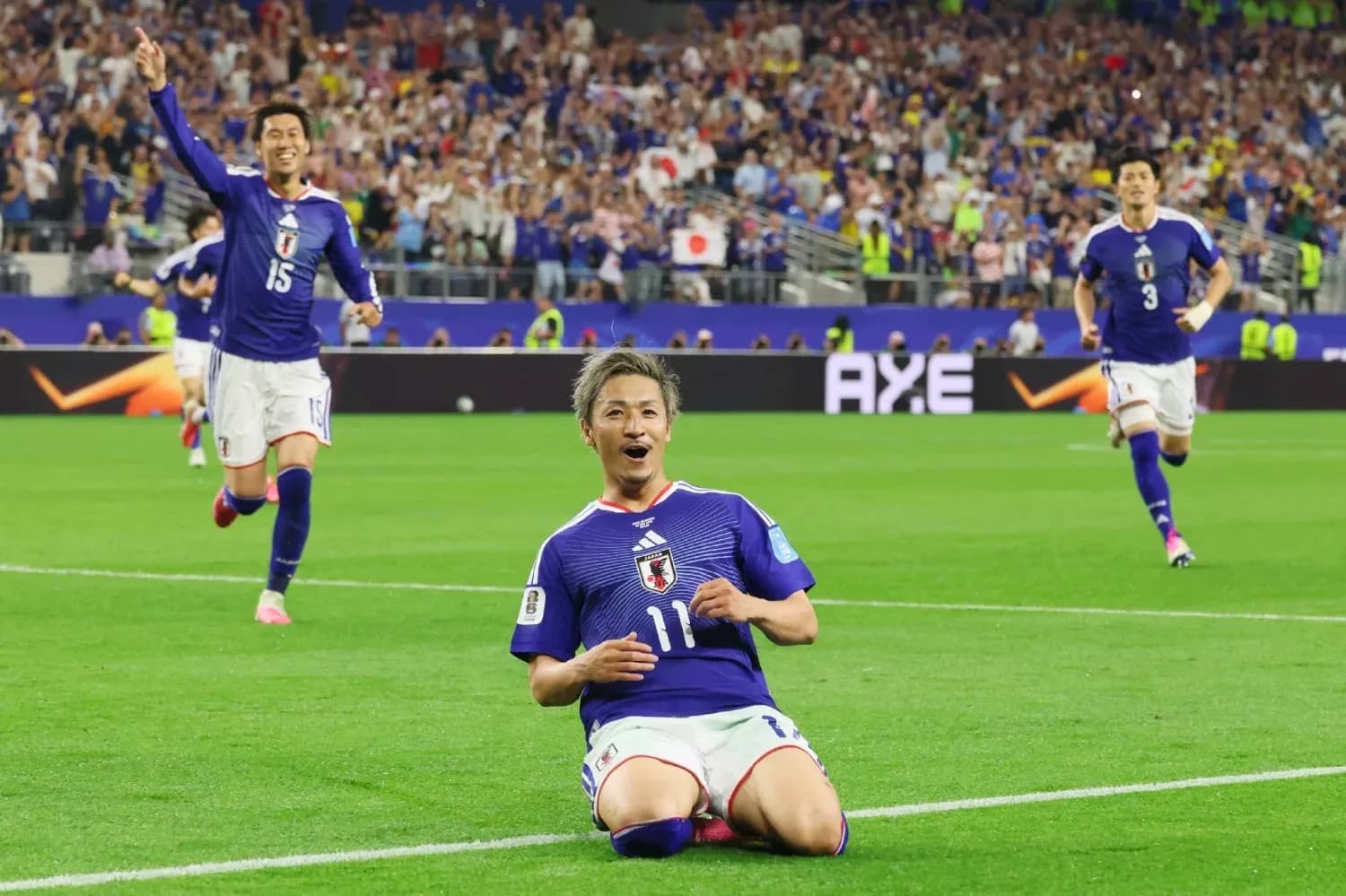 Japan players celebrating a goal during match