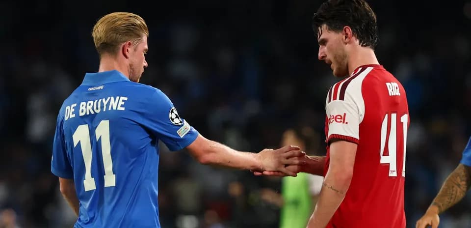 De Bruyne and Rice shaking hands on field