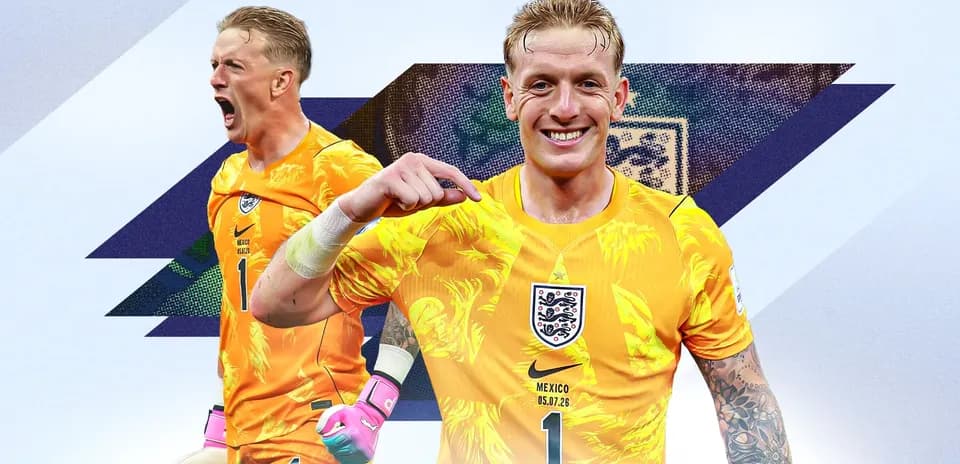 Goalkeeper celebrating in England's yellow kit