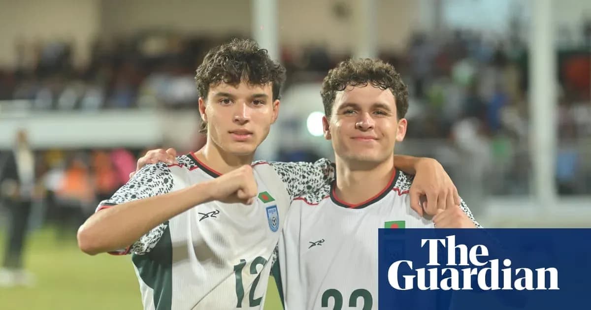 Two football players celebrating after a match